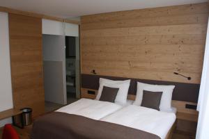 Cama ou camas em um quarto em Gasthof Rameder Zur Taverne