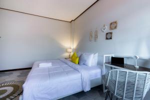 Interconnection Hostel客房内的一张或多张床位