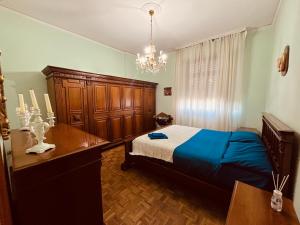 A bed or beds in a room at Affittacamere Umberto&Marisa