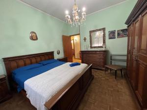 A bed or beds in a room at Affittacamere Umberto&Marisa