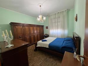 A bed or beds in a room at Affittacamere Umberto&Marisa
