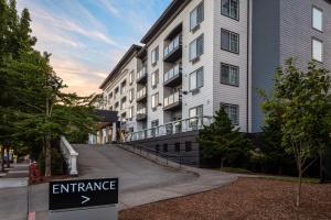 an entrance sign in front of a building at Courtyard by Marriott Portland North in Portland