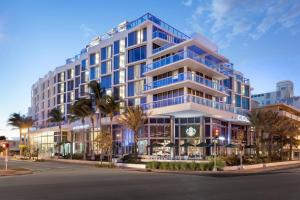 a rendering of a building on a city street at AC Hotel by Marriott Miami Beach in Miami Beach