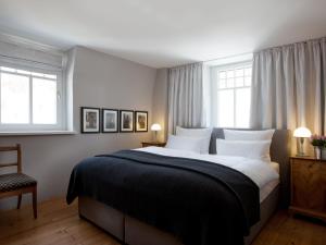 Postel nebo postele na pokoji v ubytování Boutique Apartments Bezau