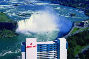 an aerial view of a waterfall in front of a building at Niagara Falls Marriott Fallsview Hotel & Spa in Niagara Falls