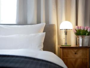 Postel nebo postele na pokoji v ubytování Boutique Apartments Bezau