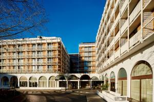 a group of buildings in front of a building at London Marriott Hotel Regents Park in London