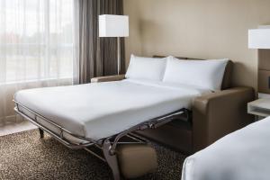 Postel nebo postele na pokoji v ubytování AC Hotel By Marriott Portland Beaverton