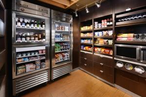 a refrigerator filled with lots of food and drinks at Courtyard by Marriott Boulder in Boulder