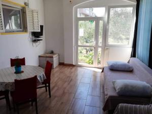 Posezení v ubytování Apartment Tkon 5827b