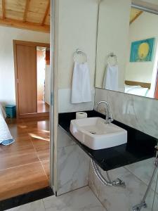Koupelna v ubytování Suites em São Thomé das Letras