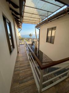 a balcony of a house with a view at AH Rent in Quintero