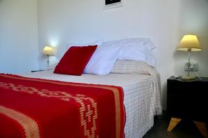 Säng eller sängar i ett rum på Palotes Sierras Cabañas