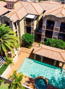 an aerial view of a house with a swimming pool at 'Little Mermaid' beach apartment best location walk to beach and restaurants - sleeps 4 in Gold Coast