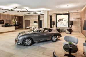 a car parked in a room with a living room at Le Méridien Hamburg in Hamburg