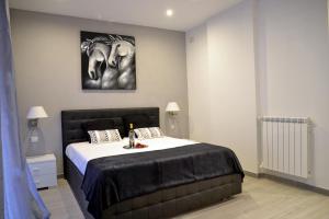 A bed or beds in a room at Gregori Guest House
