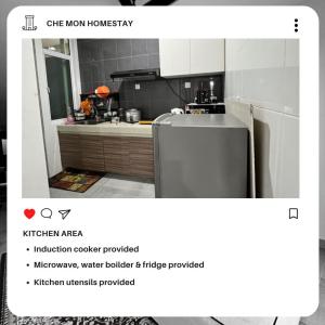 古晉的住宿－CHE MON Homestay，厨房配有不锈钢冰箱。