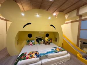 Postelja oz. postelje v sobi nastanitve Kids Fun B&B