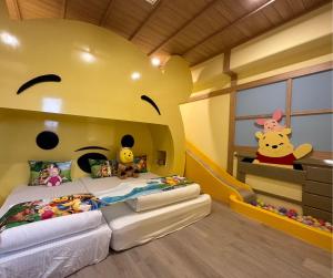 Postelja oz. postelje v sobi nastanitve Kids Fun B&B