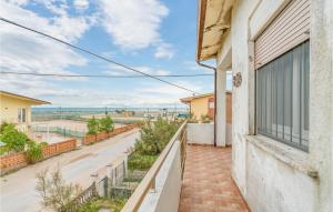 a balcony with a view of a street at Agostina 3 in Rosolina Mare