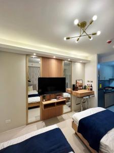 Katil atau katil-katil dalam bilik di M&M Condostay at Shore 2 Residences Tower 2 Pasay City