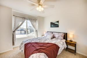 a bedroom with a bed and a window at Colorado Vacation Rental with Private Hot Tub in Monument