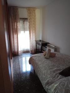 A bed or beds in a room at Bella vista