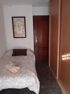 A bed or beds in a room at Bella vista