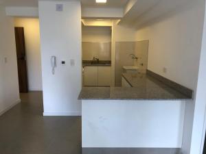 a bathroom with a sink and a mirror at Departamento equipado en mejor zona del centro de Salta in Salta