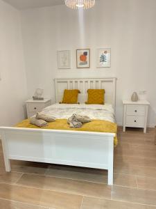 Łóżko lub łóżka w pokoju w obiekcie UIM Mediterraneo CASA Sepulveda Wifi