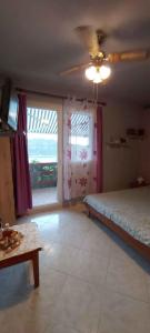 a room with a bed and a table and a window at Studio in Karbuni - Insel Korcula 6384 in Brnistrova