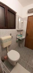 a bathroom with a toilet and a sink at Studio in Karbuni - Insel Korcula 6384 in Brnistrova