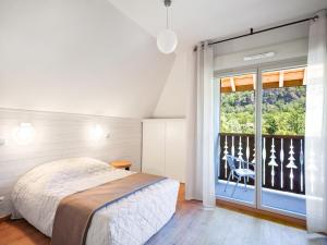 Postel nebo postele na pokoji v ubytování Lagrange Vacances Les Chalets d’Ax