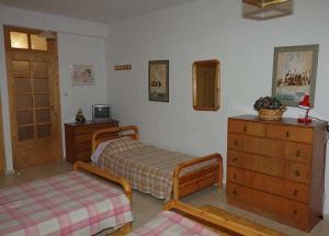 Ένα ή περισσότερα κρεβάτια σε δωμάτιο στο Elati Apartments 