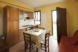Kjøkken eller kjøkkenkrok på Il poggio dei tre contadini