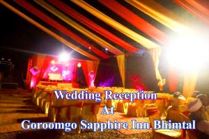 a wedding reception at a gonggang sapphire inn buffet at Hotel Sapphire Inn Bhimtal, Kaichi Dham - Parking Facilities - Best Luxury Hotel in Nainital in Nainital
