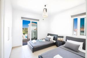 Postel nebo postele na pokoji v ubytování Casa de Nicole + 37 fotografií