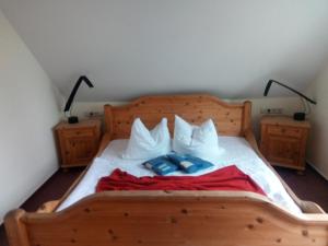 Ein Bett oder Betten in einem Zimmer der Unterkunft Ihr Ferien Hotel Brunnenhof