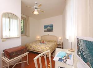 Postel nebo postele na pokoji v ubytování Hotel Villa Europa
