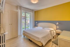 Postel nebo postele na pokoji v ubytování Hotel Villa Europa