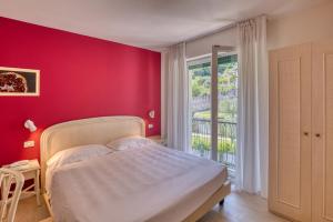 Postel nebo postele na pokoji v ubytování Hotel Villa Europa