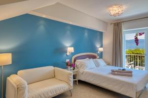 Postel nebo postele na pokoji v ubytování Hotel Villa Europa