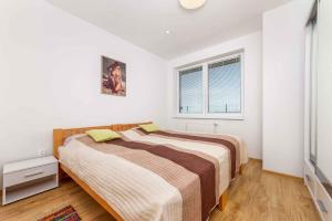Ένα ή περισσότερα κρεβάτια σε δωμάτιο στο Holiday home in Buzsak - Südtransdanubien 43397