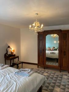 Postel nebo postele na pokoji v ubytování La Forge, Lieu des Chevilloux