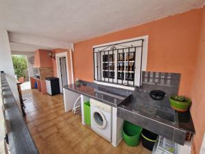 Kuchyňa alebo kuchynka v ubytovaní House Mare Nostrum