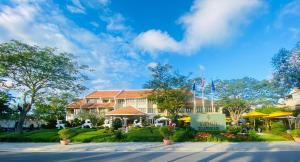 a view of a hotel from the street at Almanity Hoi An Resort & Spa in Hoi An