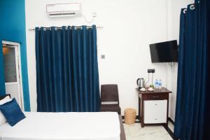 Postel nebo postele na pokoji v ubytování Ayubowan Homestay Katunayake