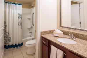 a bathroom with a sink and a toilet and a shower at Residence Inn Pittsburgh North Shore in Pittsburgh
