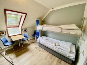 Poschodová posteľ alebo postele v izbe v ubytovaní Danhostel Skagen