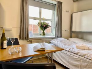 Postel nebo postele na pokoji v ubytování Danhostel Skagen